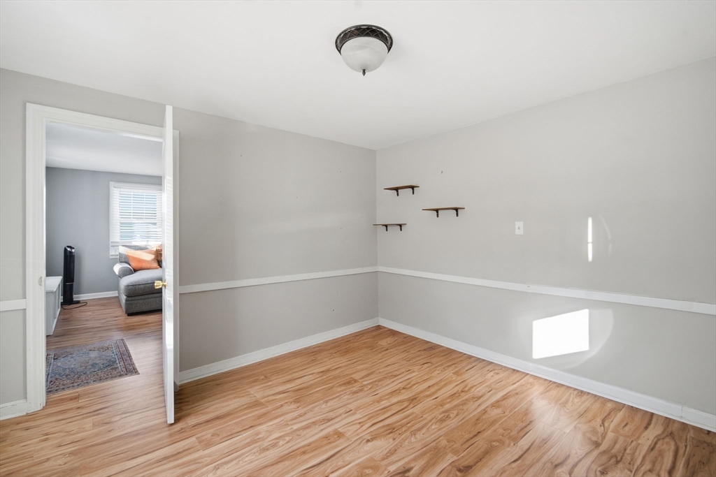 13 Bither Street Springfield, MA 01118 - Photo 26 of 29 a view of a livingroom with wooden floor
