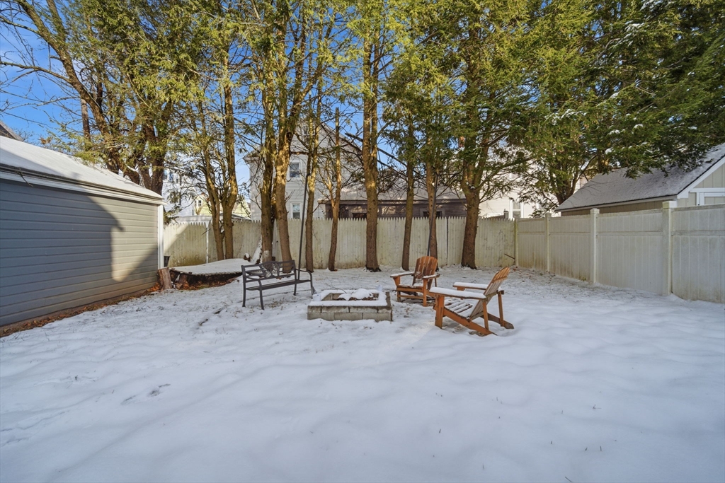 13 Bither Street Springfield, MA 01118 - Photo 29 of 29 a view of a bench in a backyard