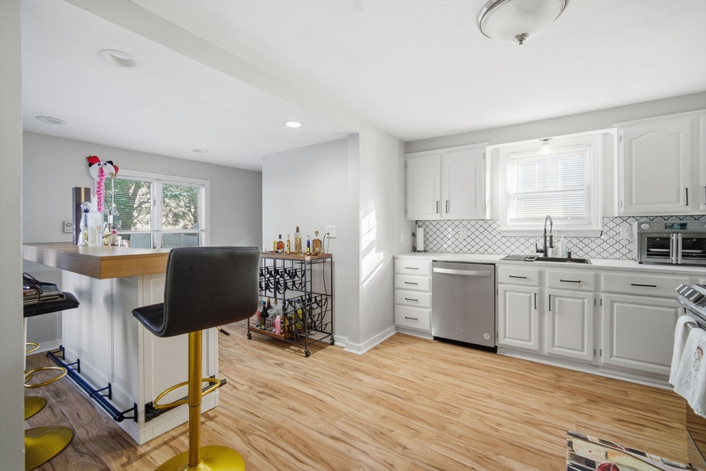 13 Bither Street Springfield, MA 01118 - Photo 8 of 29 a kitchen with a sink cabinets and window