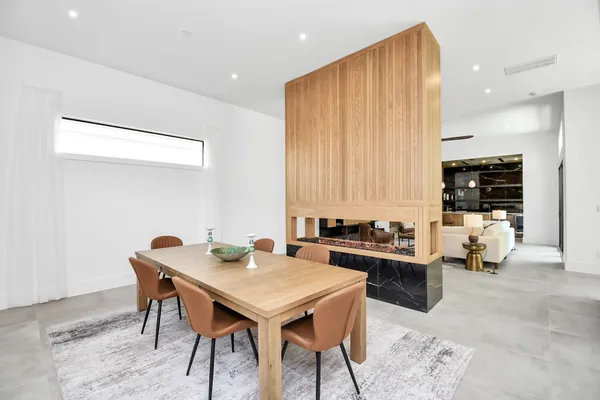 a view of a dining room with furniture