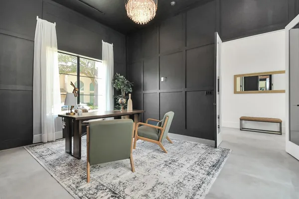 a dining room with furniture and window