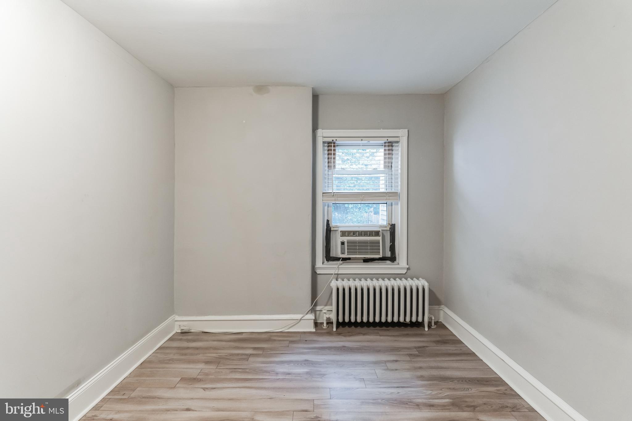 4483 Boone Street Philadelphia, PA 19128 - Photo 11 of 15 a view of a room with wooden floor and a window