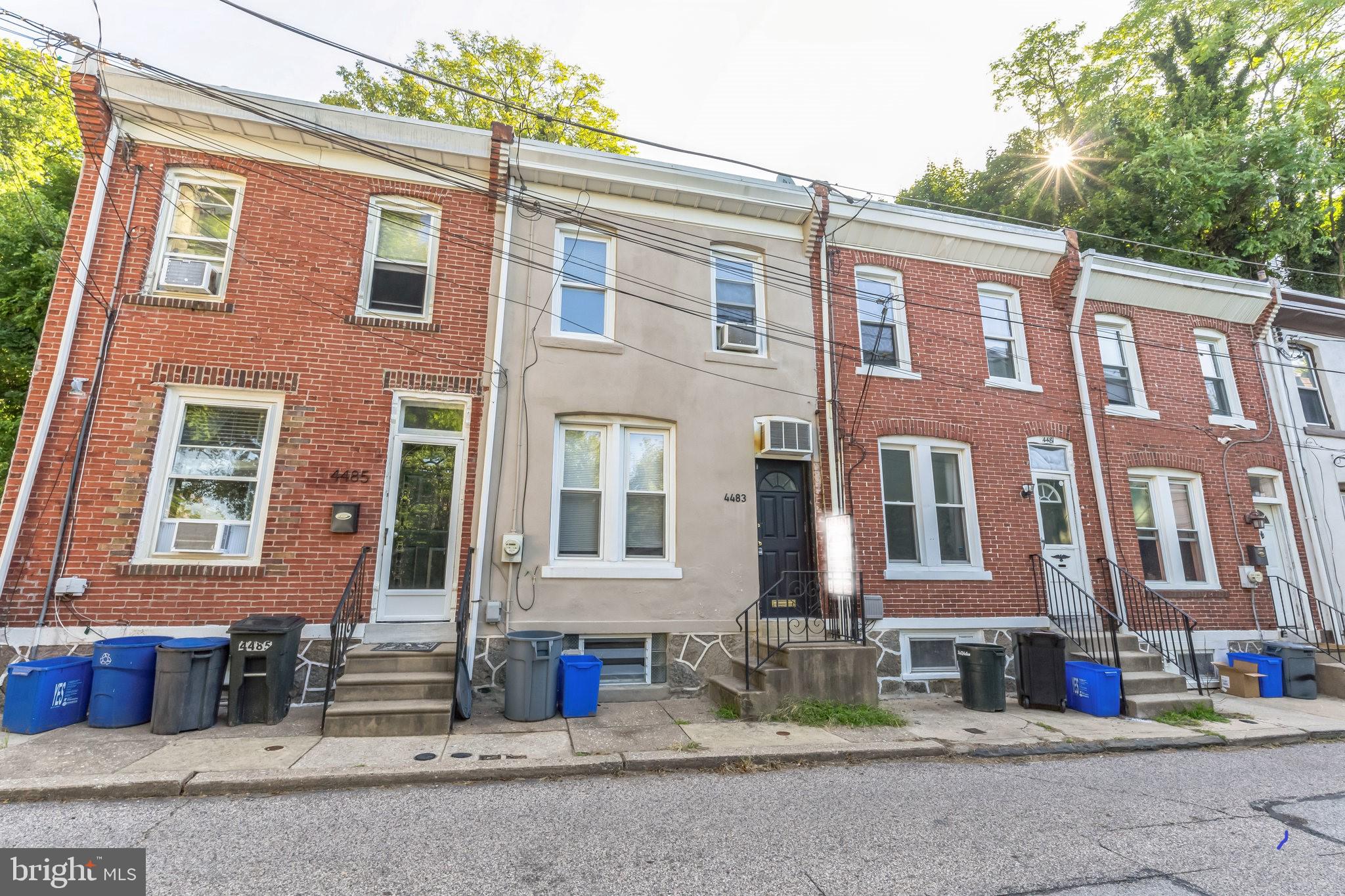 4483 Boone Street Philadelphia, PA 19128 - Photo 2 of 15 a view of a brick building with many windows
