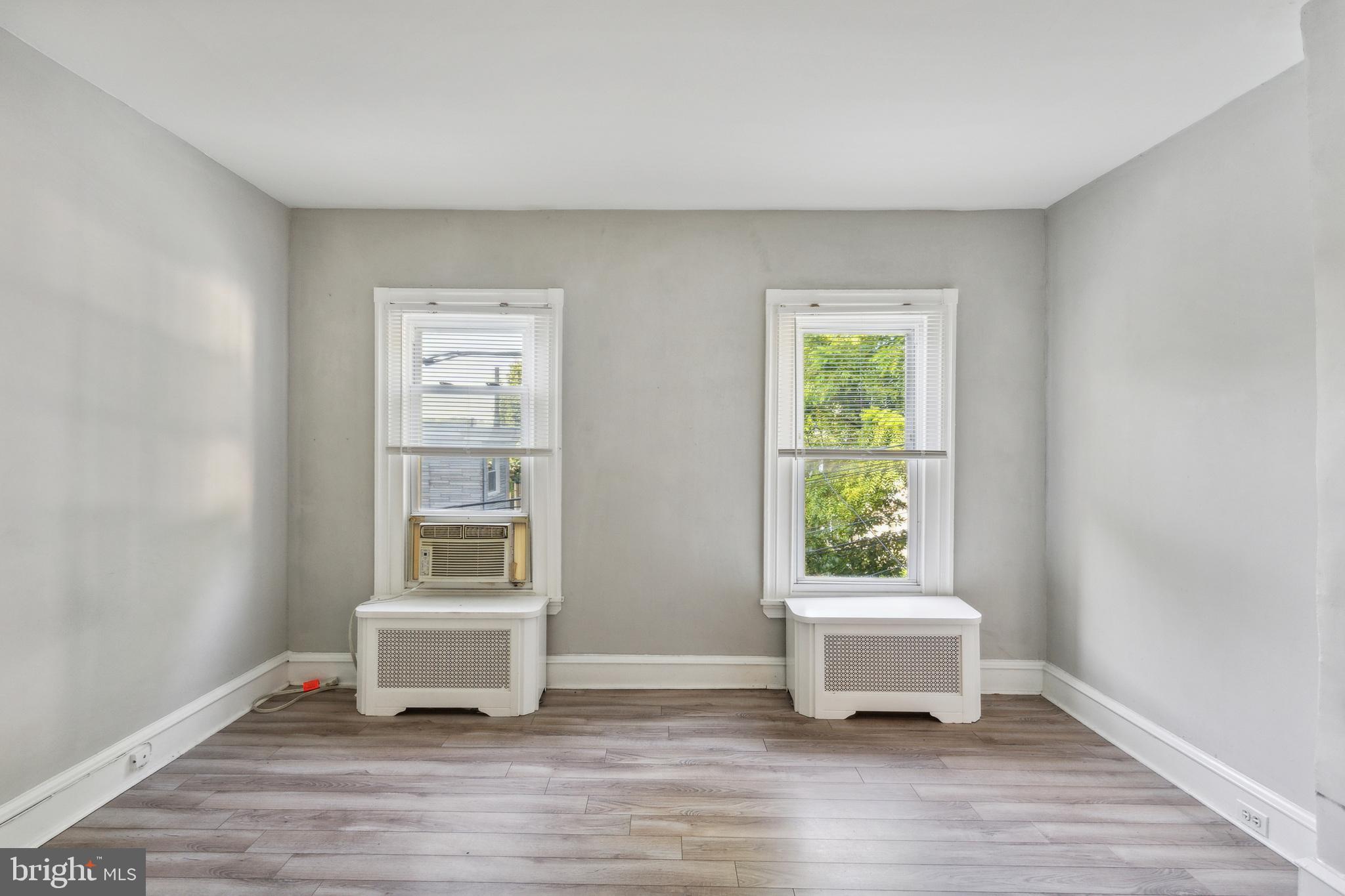 4483 Boone Street Philadelphia, PA 19128 - Photo 9 of 15 a living room with a window and a wooden floor