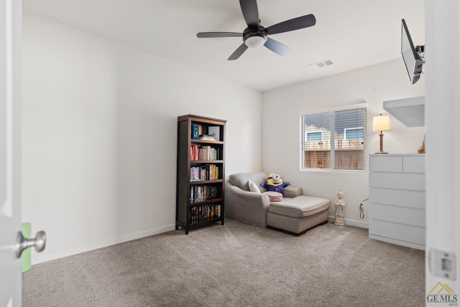 Undisclosed Address Bakersfield, CA 93314 - Photo 35 of 44 a living room with furniture and a window