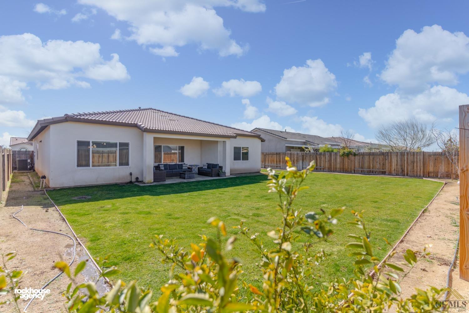 Undisclosed Address Bakersfield, CA 93314 - Photo 41 of 44 a view of a house with a big yard