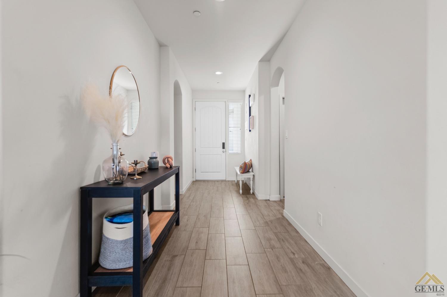 Undisclosed Address Bakersfield, CA 93314 - Photo 5 of 44 a view of a bedroom from a hallway