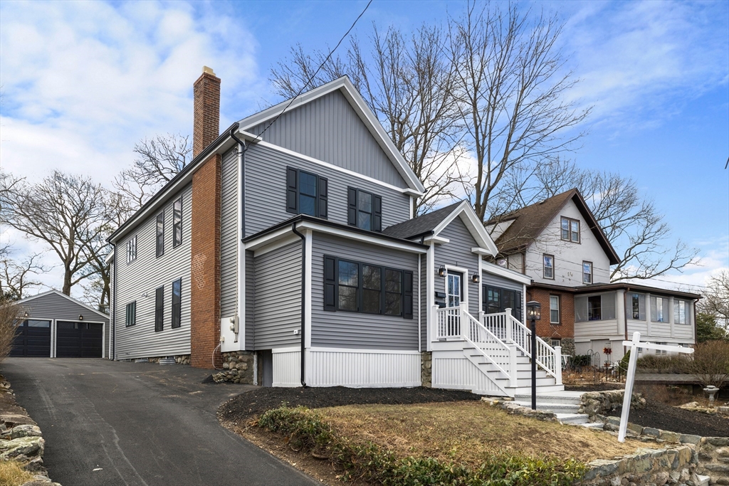 1 Overlook Road Wakefield, MA 01880 - Photo 1 of 15 a white house that has tree in front of it