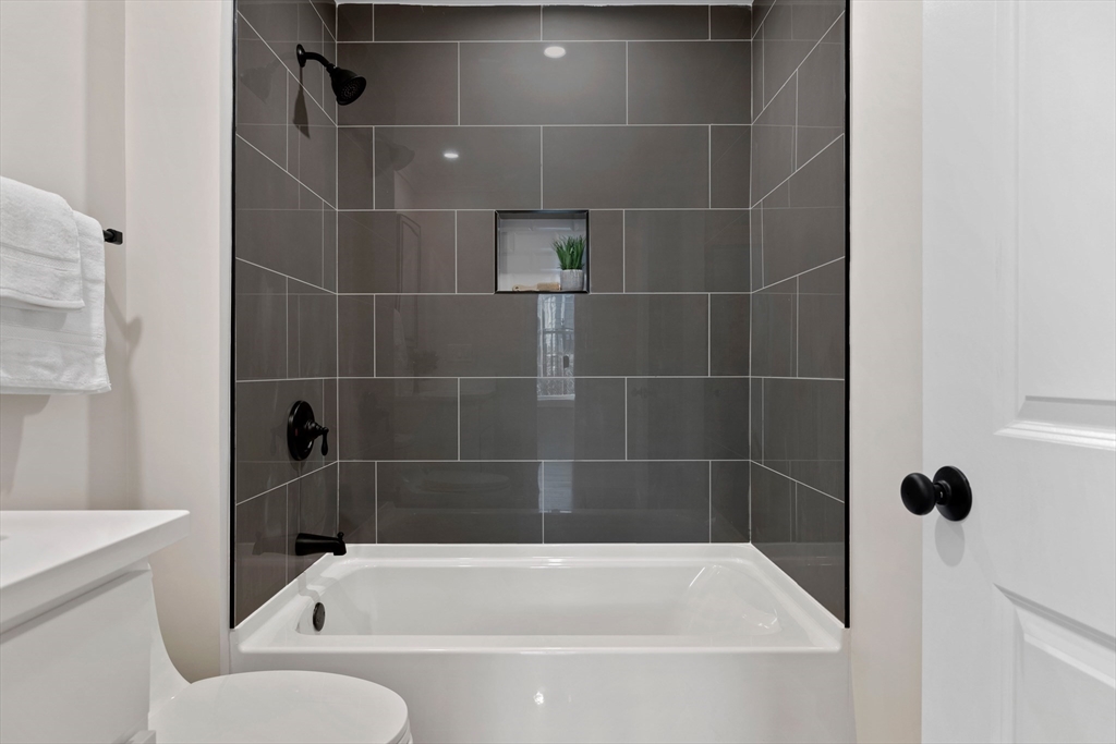 1 Overlook Road Wakefield, MA 01880 - Photo 12 of 15 a bathroom with a bathtub and a shower