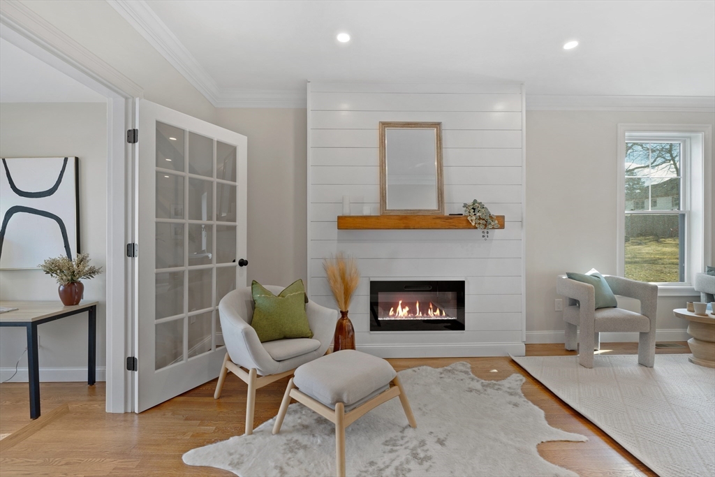 1 Overlook Road Wakefield, MA 01880 - Photo 3 of 15 a living room with furniture and a fireplace
