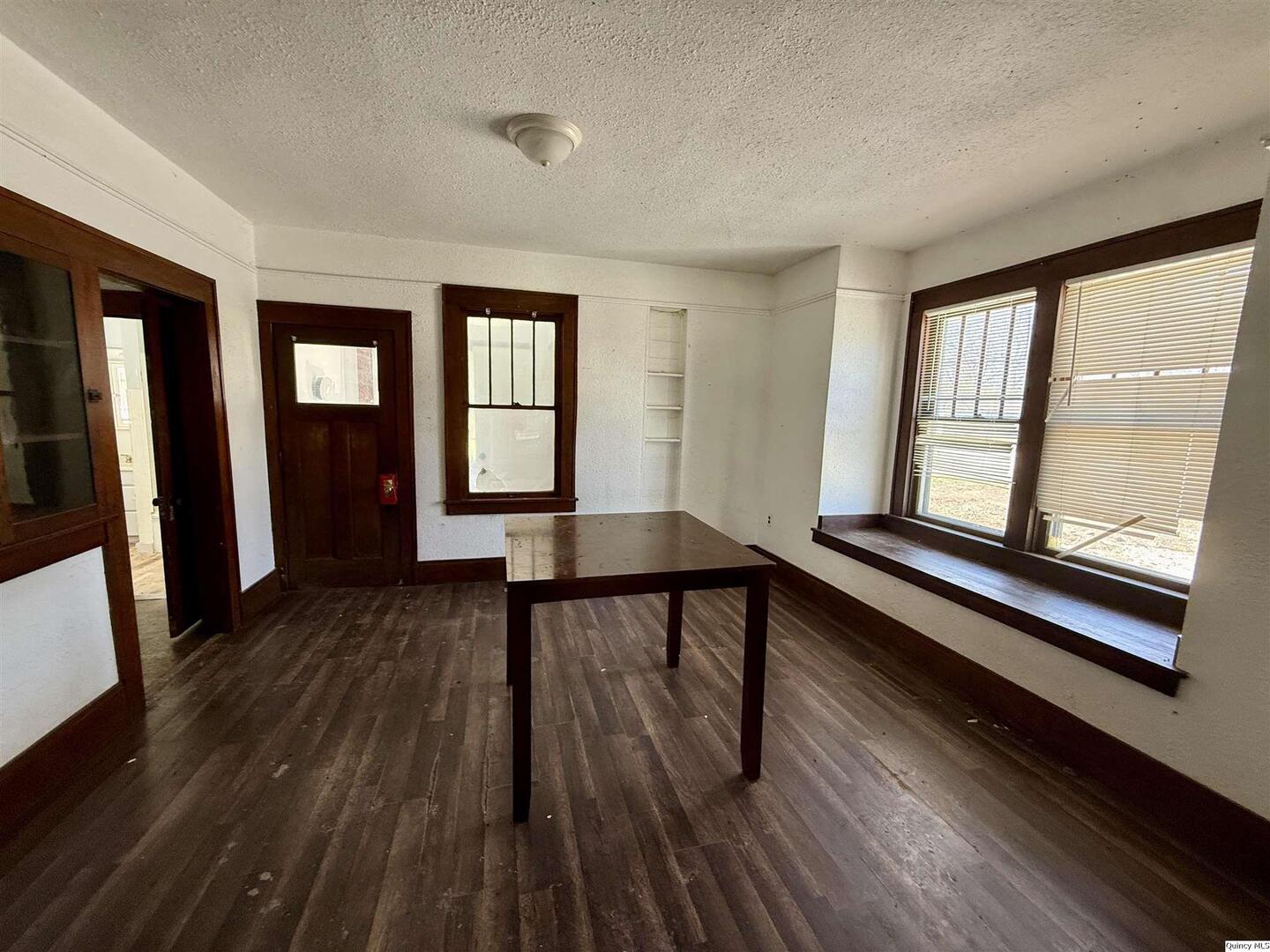 622 East Center Street Loraine, IL 62349 - Photo 10 of 21 a view of a room with wooden floors and stairs