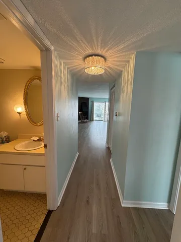 a view of a swimming pool with a yard