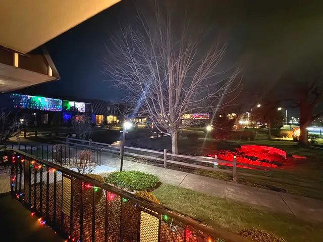 a sign board with parking space