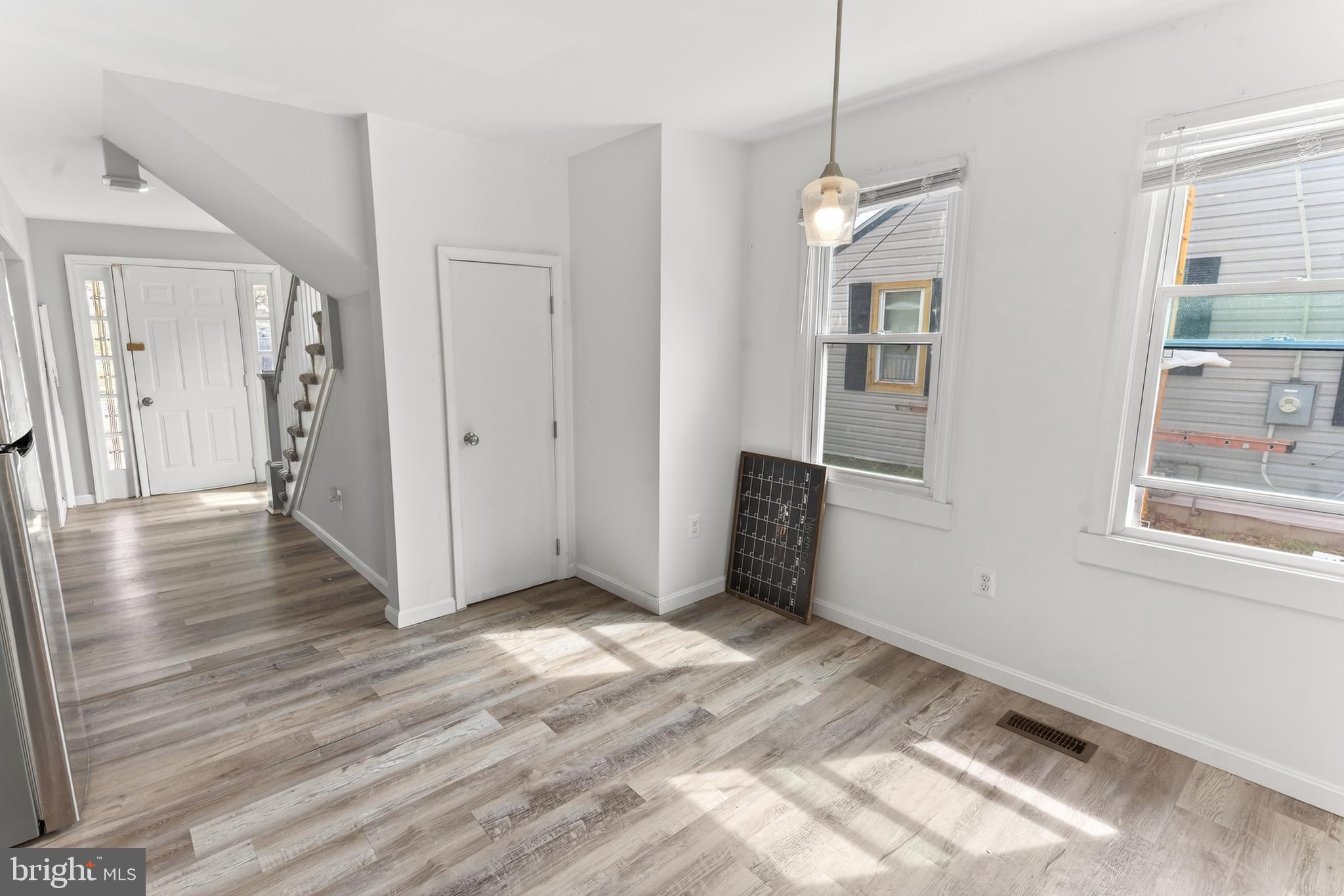 1002 West Main Street Salisbury, MD 21801 - Photo 18 of 31 a view of a room with wooden floor and windows