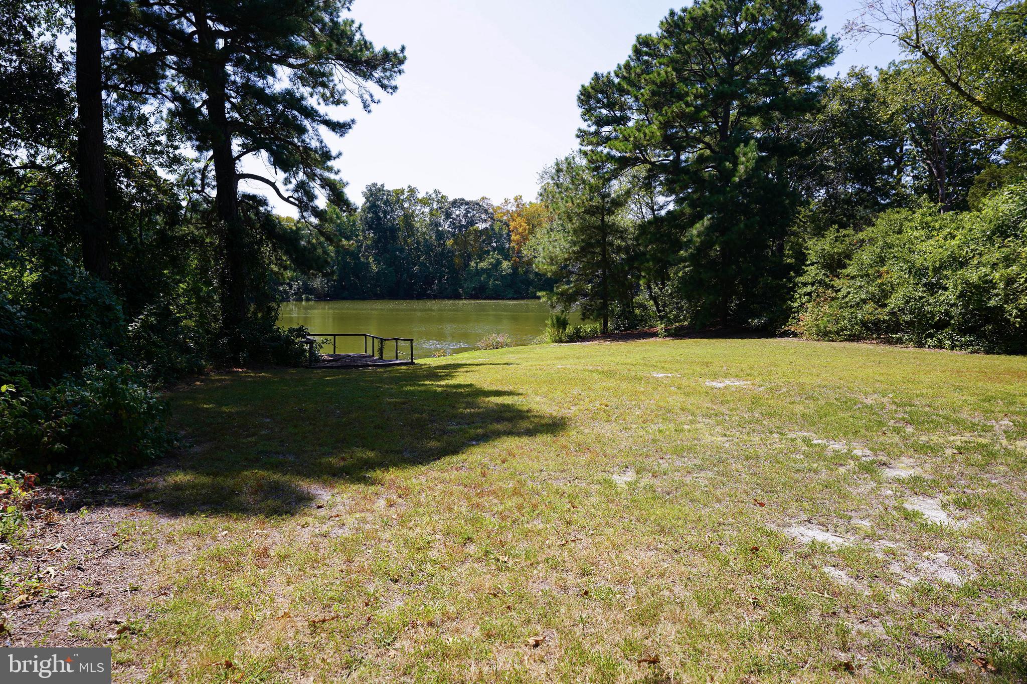 1002 West Main Street Salisbury, MD 21801 - Photo 2 of 31 a view of a swimming pool with a yard