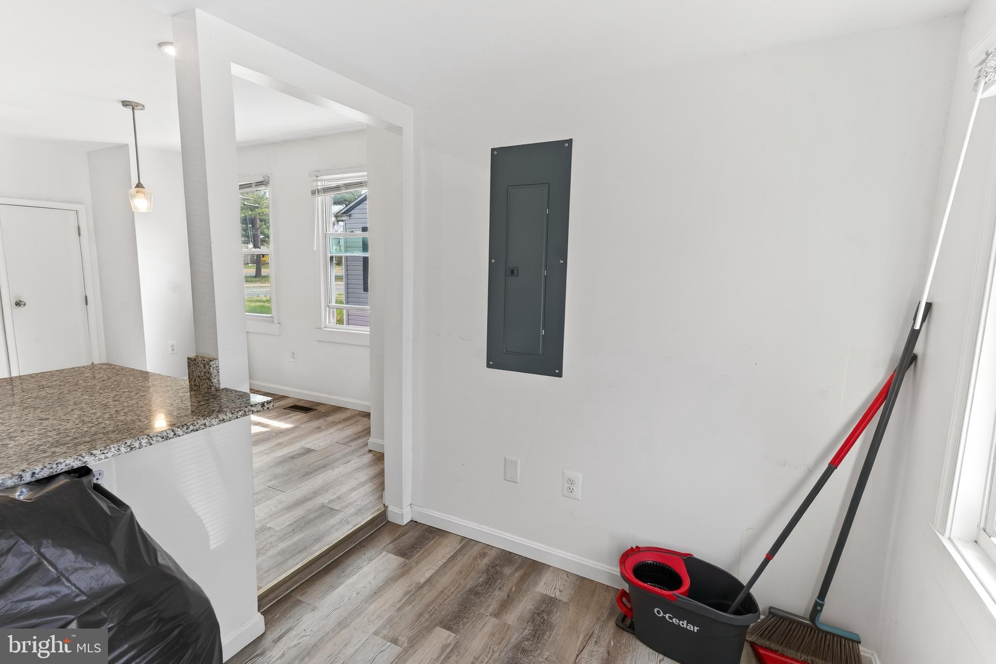 1002 West Main Street Salisbury, MD 21801 - Photo 21 of 31 a living room with a bed and a couch