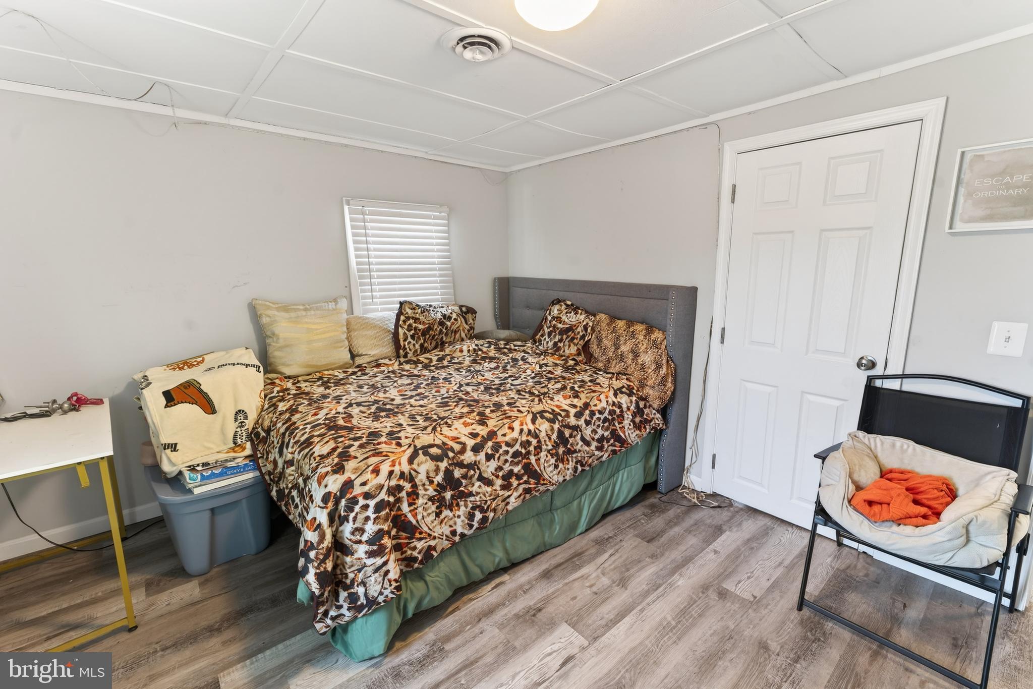 1002 West Main Street Salisbury, MD 21801 - Photo 25 of 31 a bed sitting in a bedroom next to a window