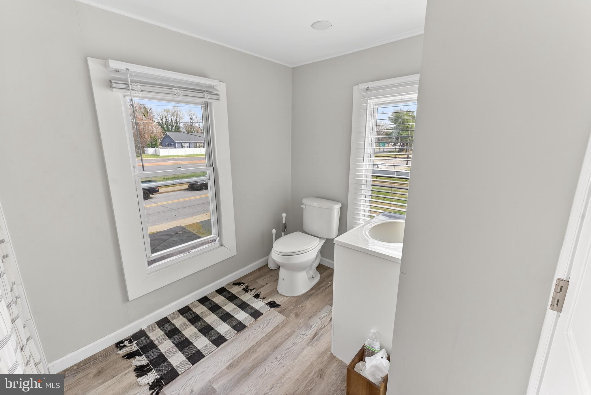 1002 West Main Street Salisbury, MD 21801 - Photo 27 of 31 a bathroom with a toilet