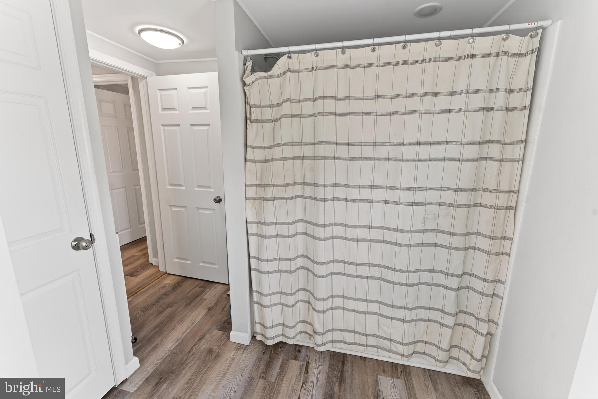 1002 West Main Street Salisbury, MD 21801 - Photo 29 of 31 a bathroom with a shower