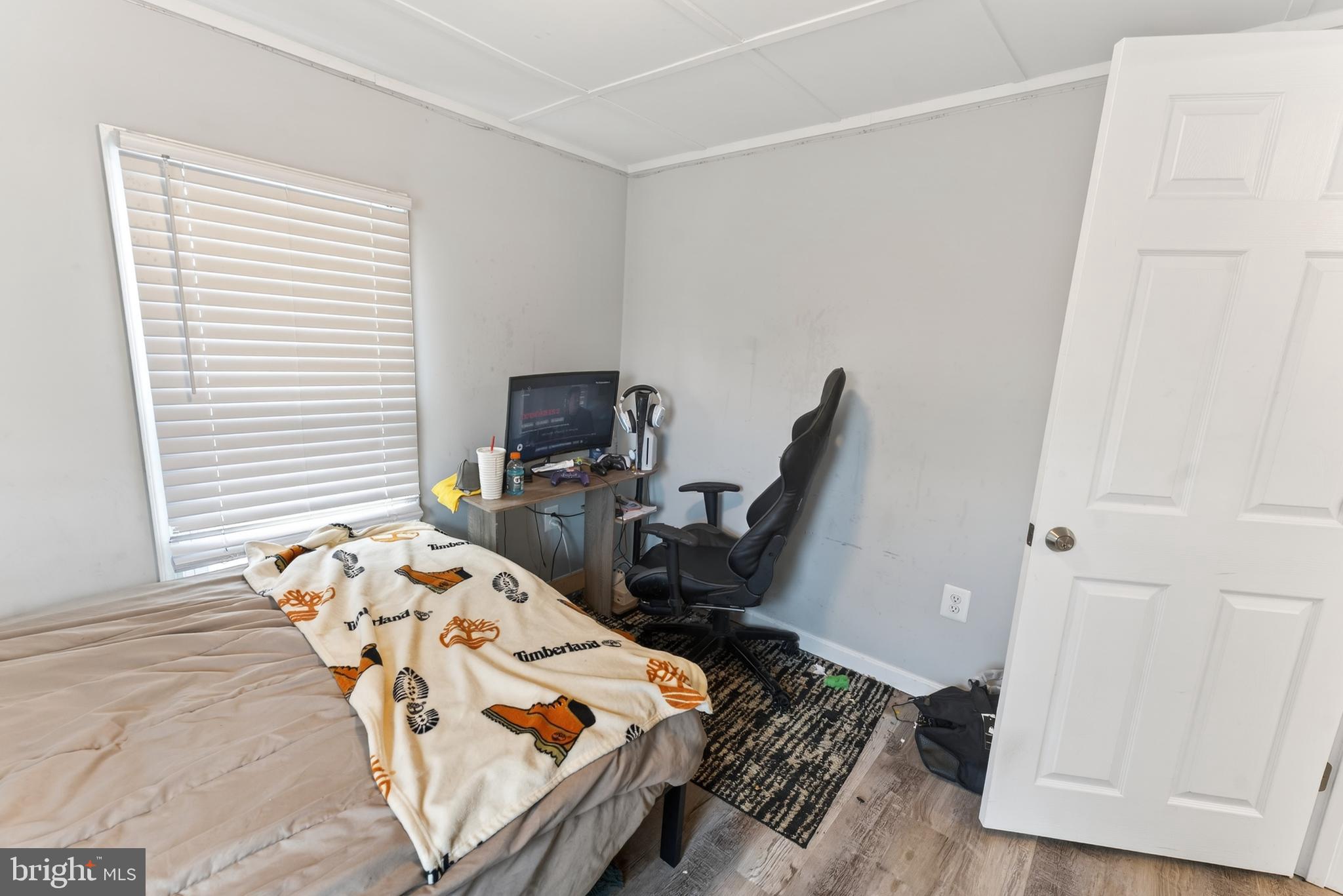 1002 West Main Street Salisbury, MD 21801 - Photo 31 of 31 a view of a workspace with furniture and a window