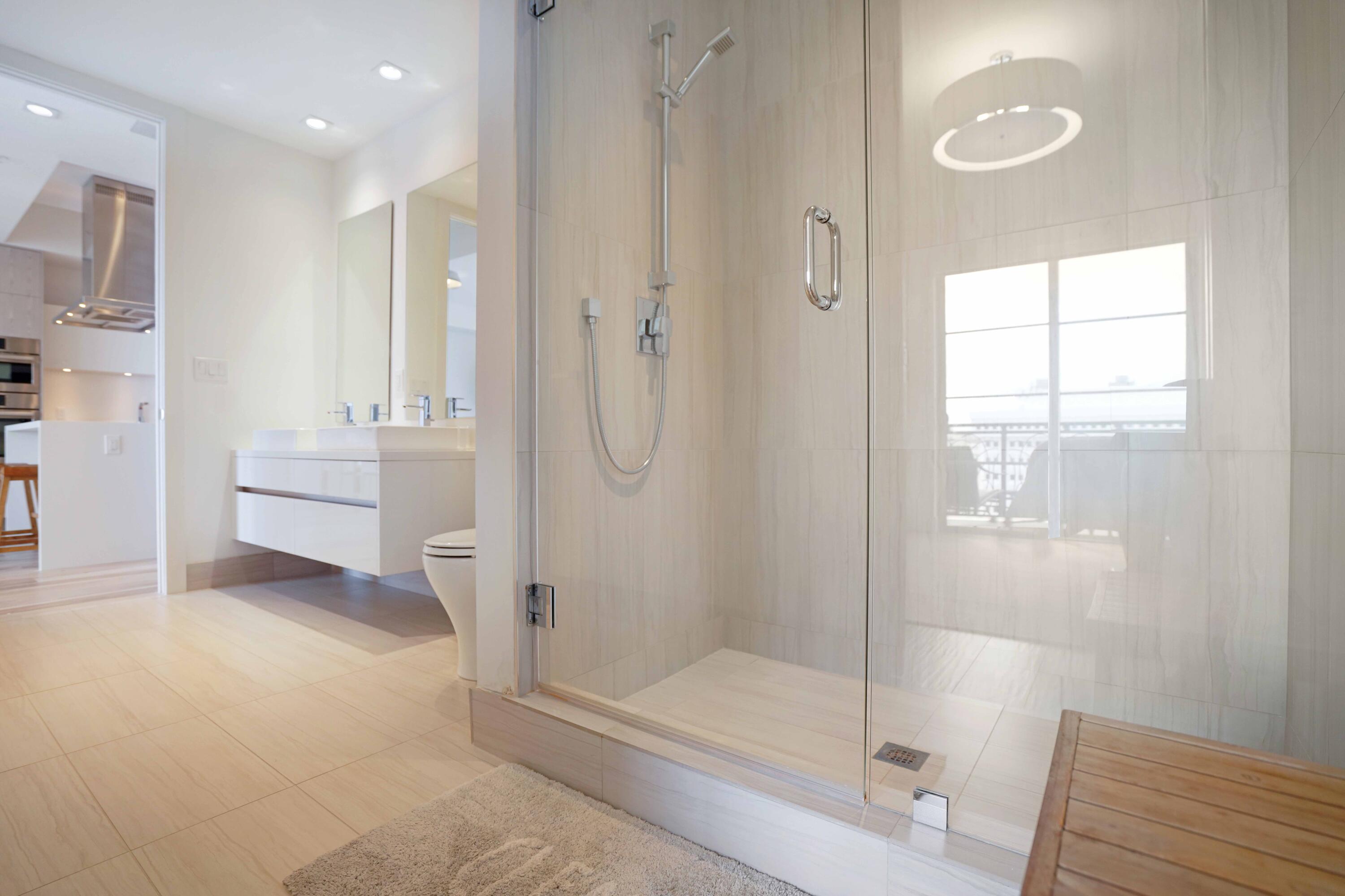 155 East Boca Raton Road, Unit 912 Boca Raton, FL 33432 - Photo 15 of 56 a bathroom with a shower and a toilet