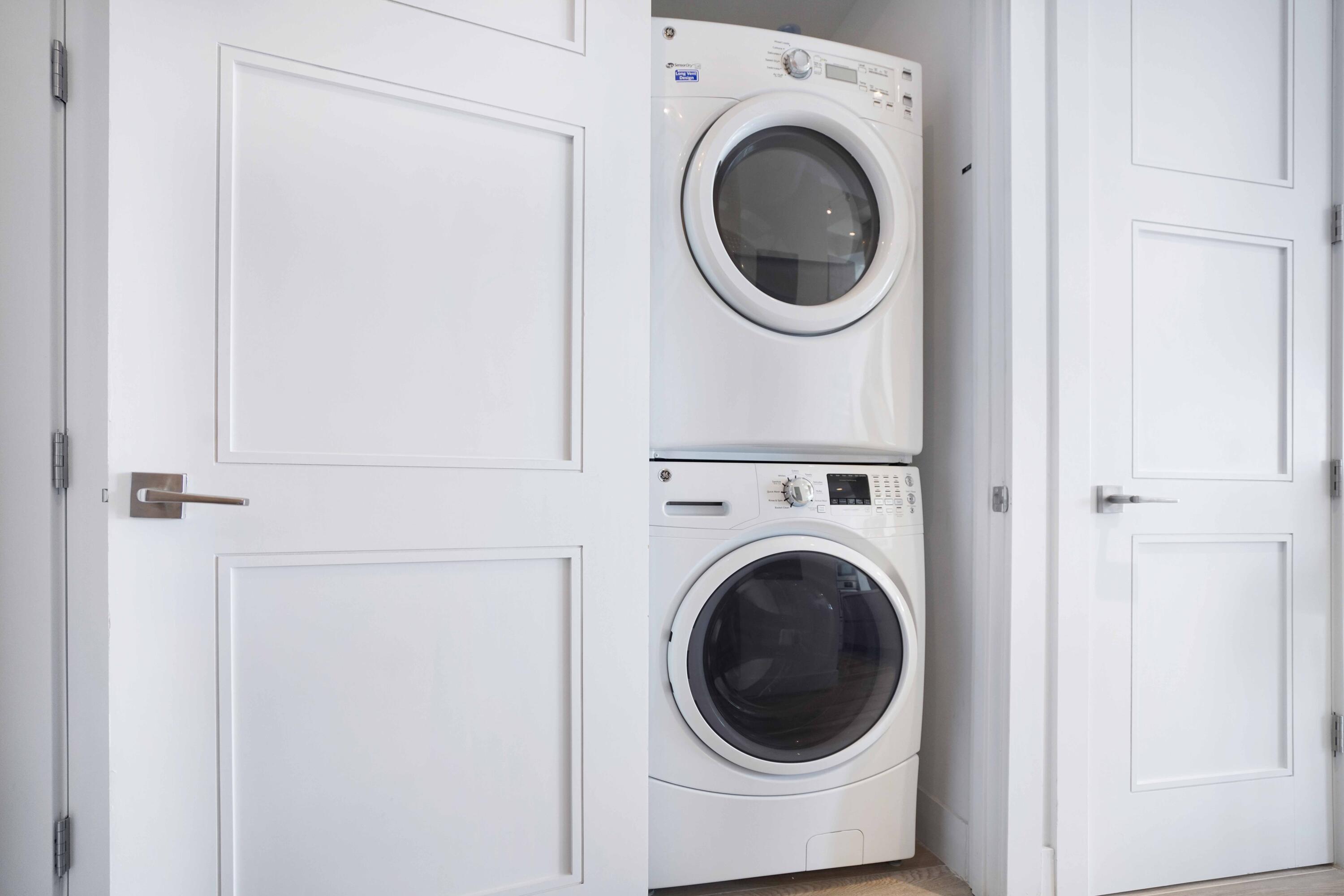 155 East Boca Raton Road, Unit 912 Boca Raton, FL 33432 - Photo 54 of 56 a utility room with dryer and washer