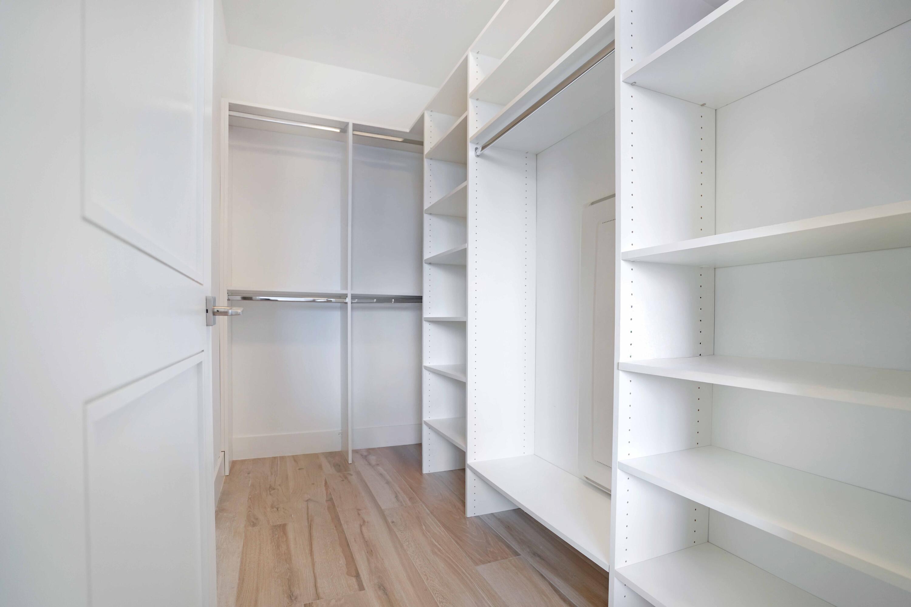 155 East Boca Raton Road, Unit 912 Boca Raton, FL 33432 - Photo 55 of 56 a view of walk in closet with empty racks