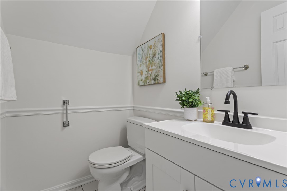 1316 Ware Road Henrico, VA 23229 - Photo 12 of 51 a bathroom with a sink toilet and a mirror
