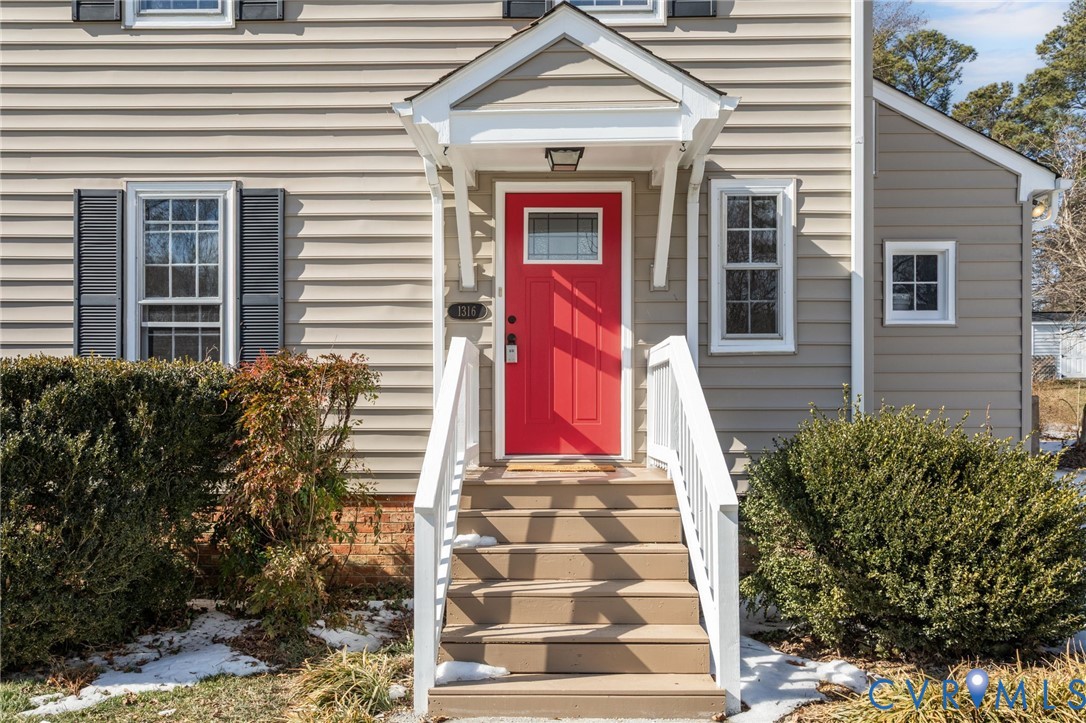 1316 Ware Road Henrico, VA 23229 - Photo 5 of 51 a front view of a house with a yard