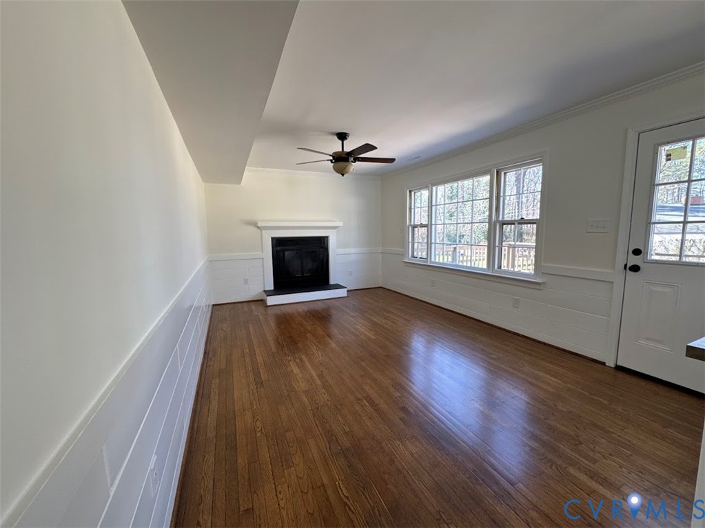 1316 Ware Road Henrico, VA 23229 - Photo 6 of 19 Unfurnished living room featuring wainscoting, dar