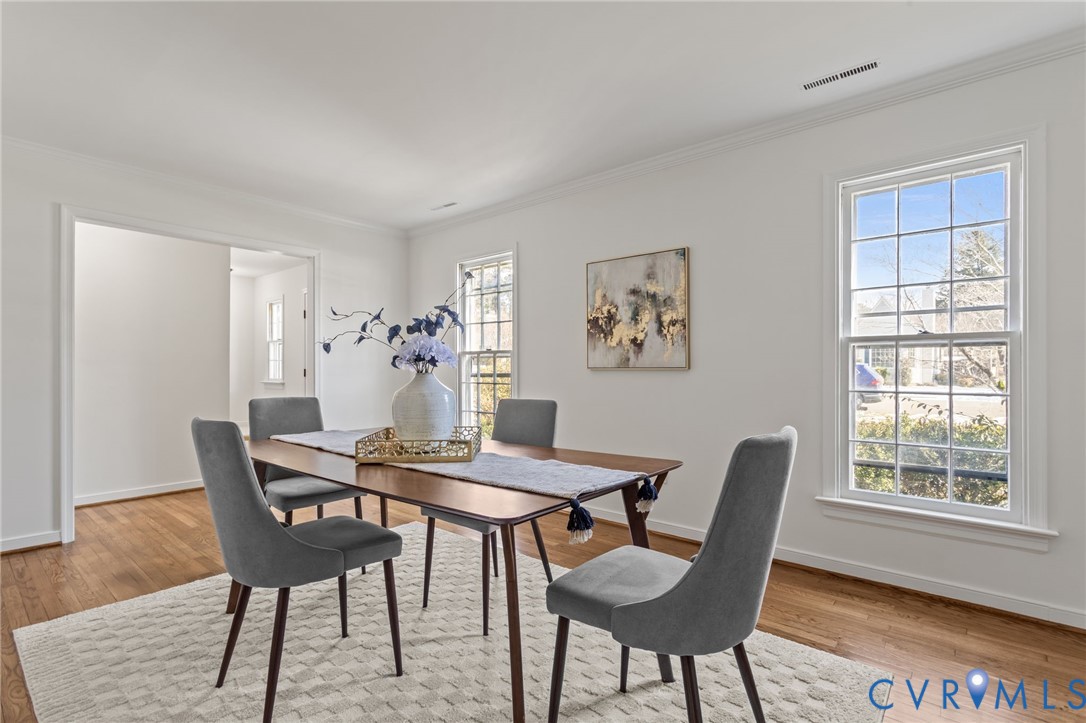 1316 Ware Road Henrico, VA 23229 - Photo 8 of 51 a view of a dining room with furniture window and wooden floor