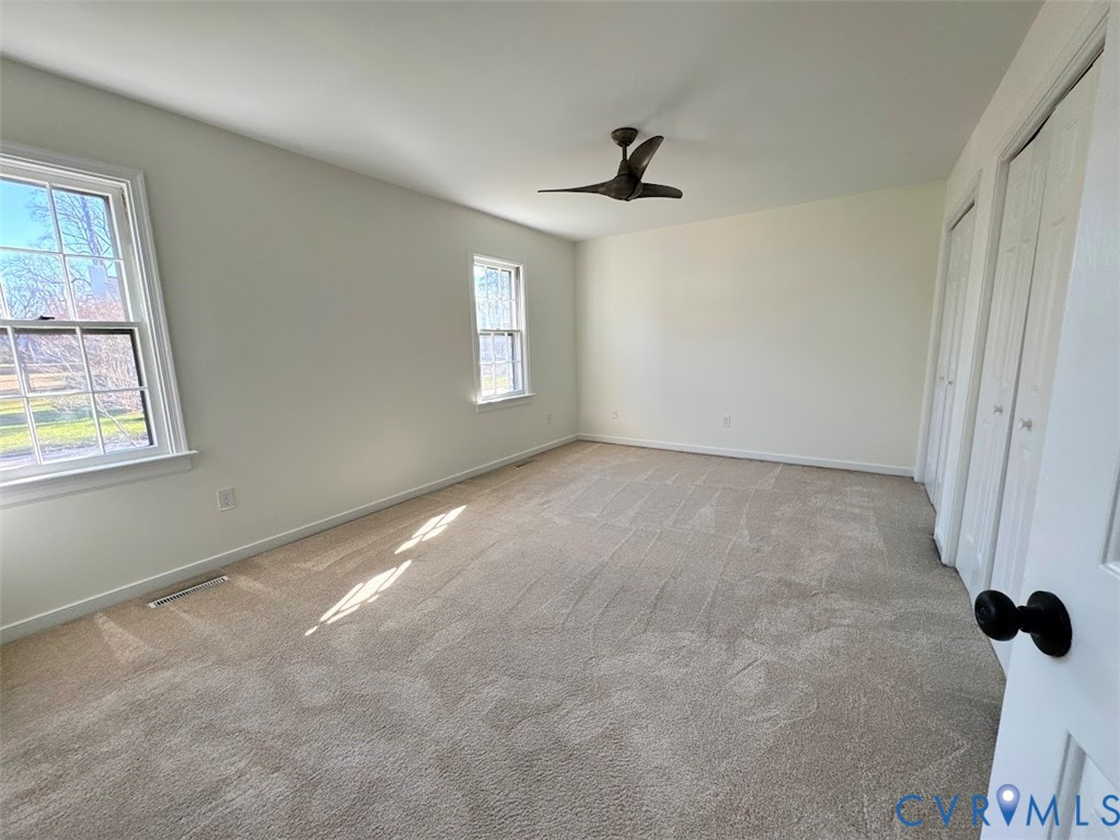 1316 Ware Road Henrico, VA 23229 - Photo 10 of 19 Unfurnished bedroom with carpet, a ceiling fan, an