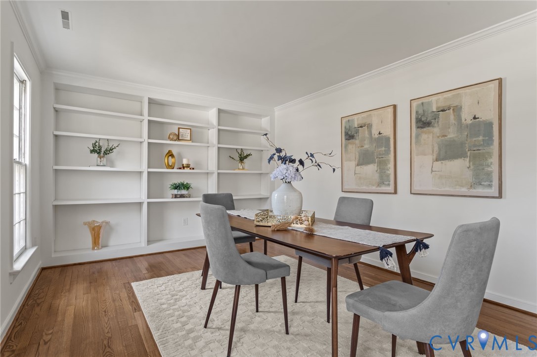 1316 Ware Road Henrico, VA 23229 - Photo 10 of 51 a view of a dining room with furniture and wooden floor