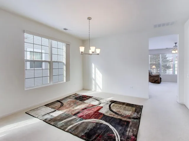 a bedroom with bed and a couch