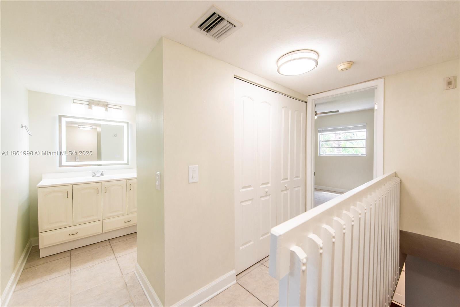 4600 Southwest 67th Avenue, Unit 237 Miami, FL 33155 - Photo 10 of 18 a view of an entryway with wooden floor