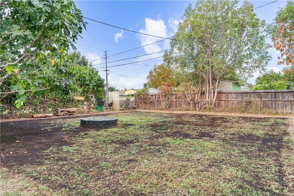 2234 South Standard Avenue Santa Ana, CA 92707 - Photo 30 of 30 a view of a yard with wooden fence