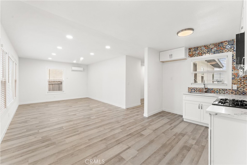 2234 South Standard Avenue Santa Ana, CA 92707 - Photo 8 of 30 a view of kitchen and wooden floor