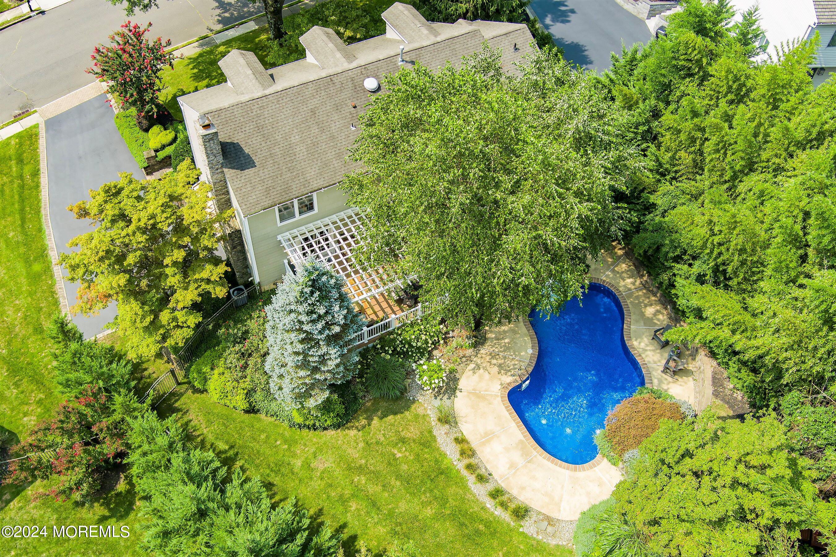 15 Doherty Drive Middletown, NJ 07748 - Photo 13 of 55 an aerial view of a house with a yard and plants