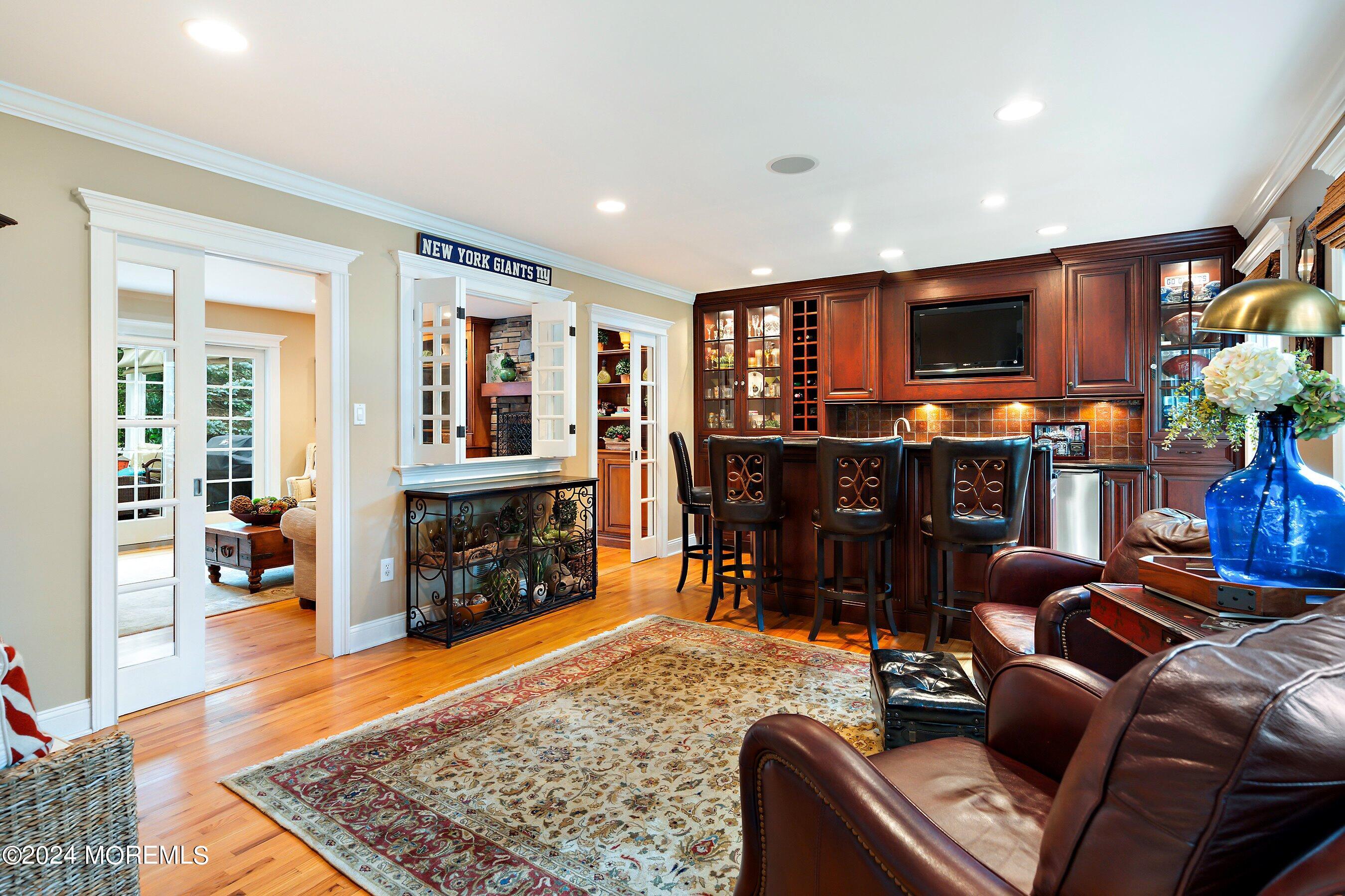 15 Doherty Drive Middletown, NJ 07748 - Photo 24 of 55 a living room with furniture and a fireplace