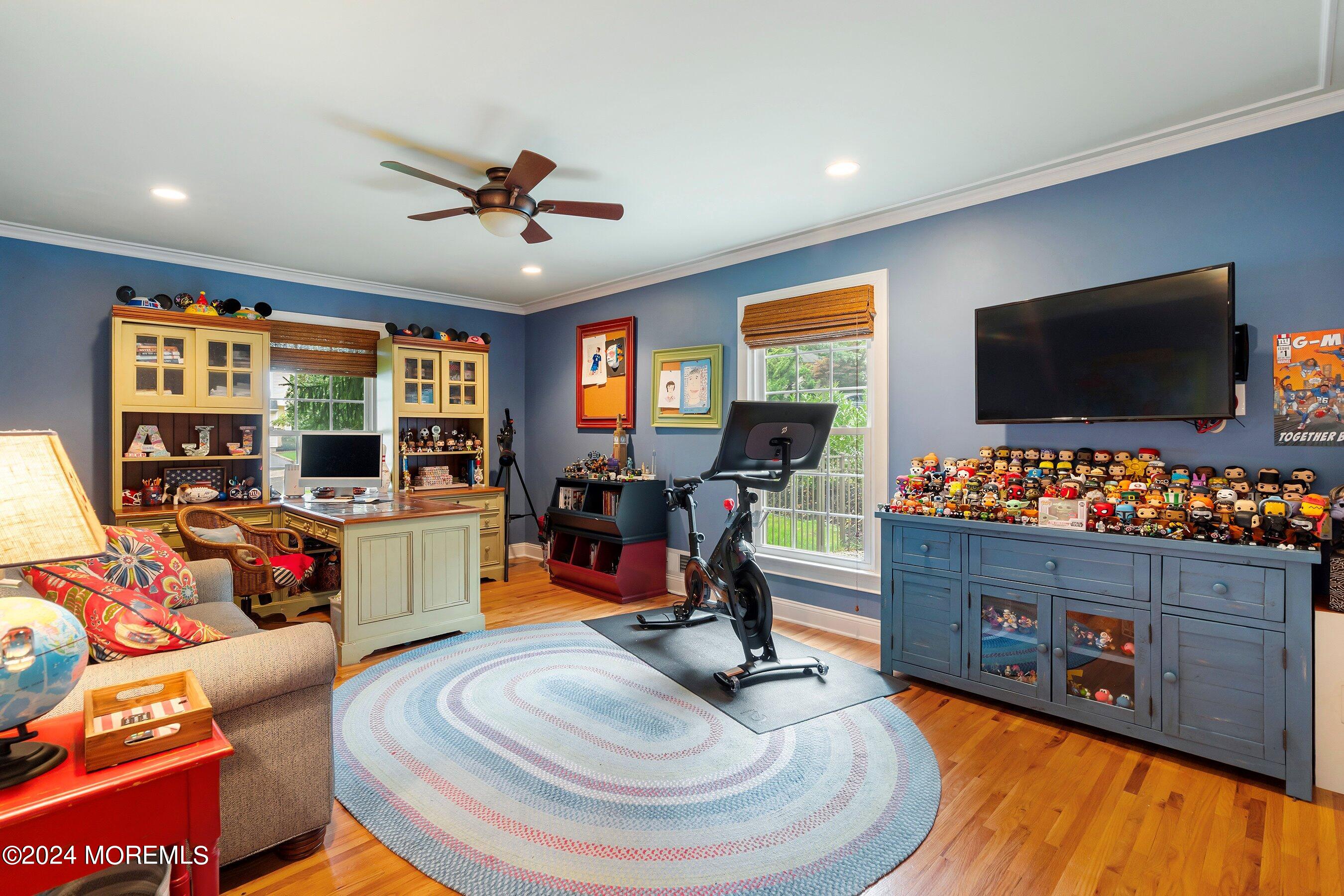 15 Doherty Drive Middletown, NJ 07748 - Photo 28 of 55 a living room with furniture and a flat screen tv