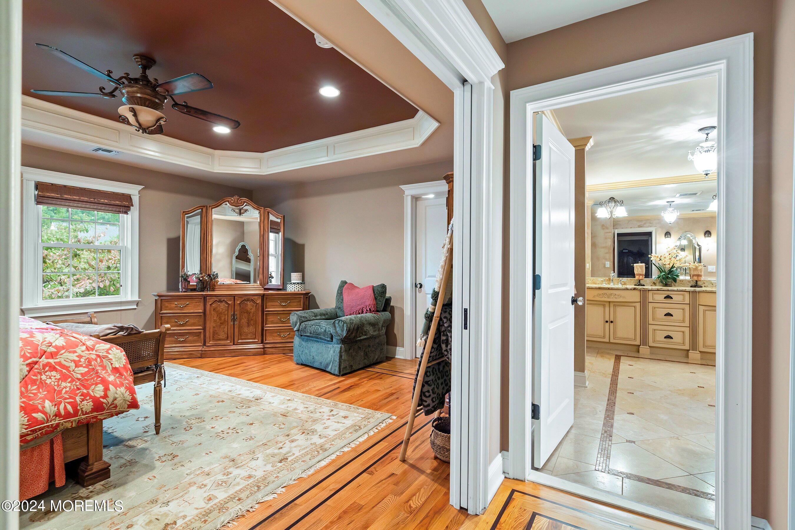 15 Doherty Drive Middletown, NJ 07748 - Photo 33 of 55 a living room with furniture and a flat screen tv