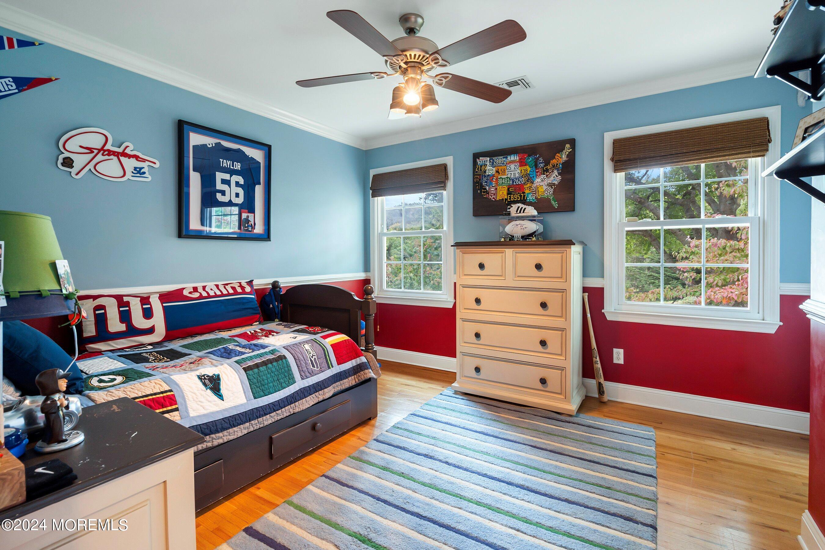 15 Doherty Drive Middletown, NJ 07748 - Photo 38 of 55 a living room with furniture and a flat screen tv
