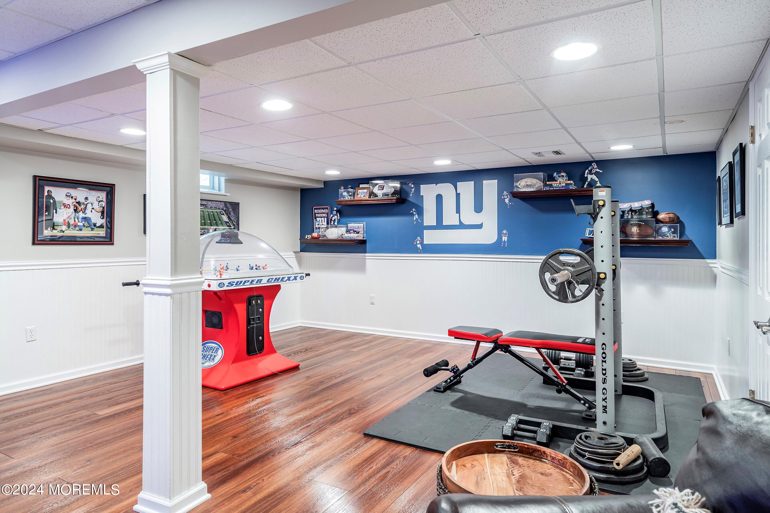 15 Doherty Drive Middletown, NJ 07748 - Photo 42 of 55 a room with furniture a rug and white walls