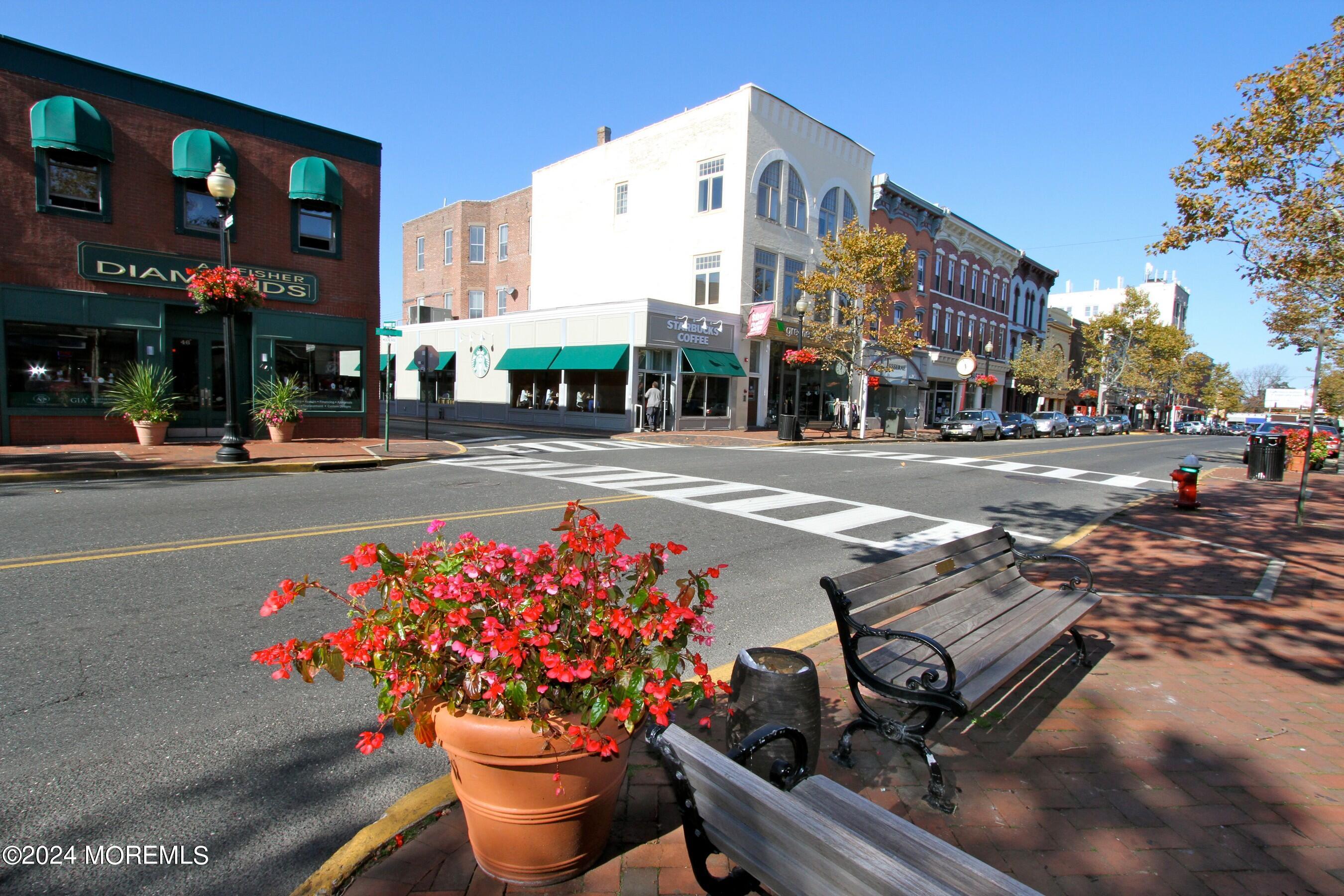 15 Doherty Drive Middletown, NJ 07748 - Photo 49 of 55 a front view of a building with street view