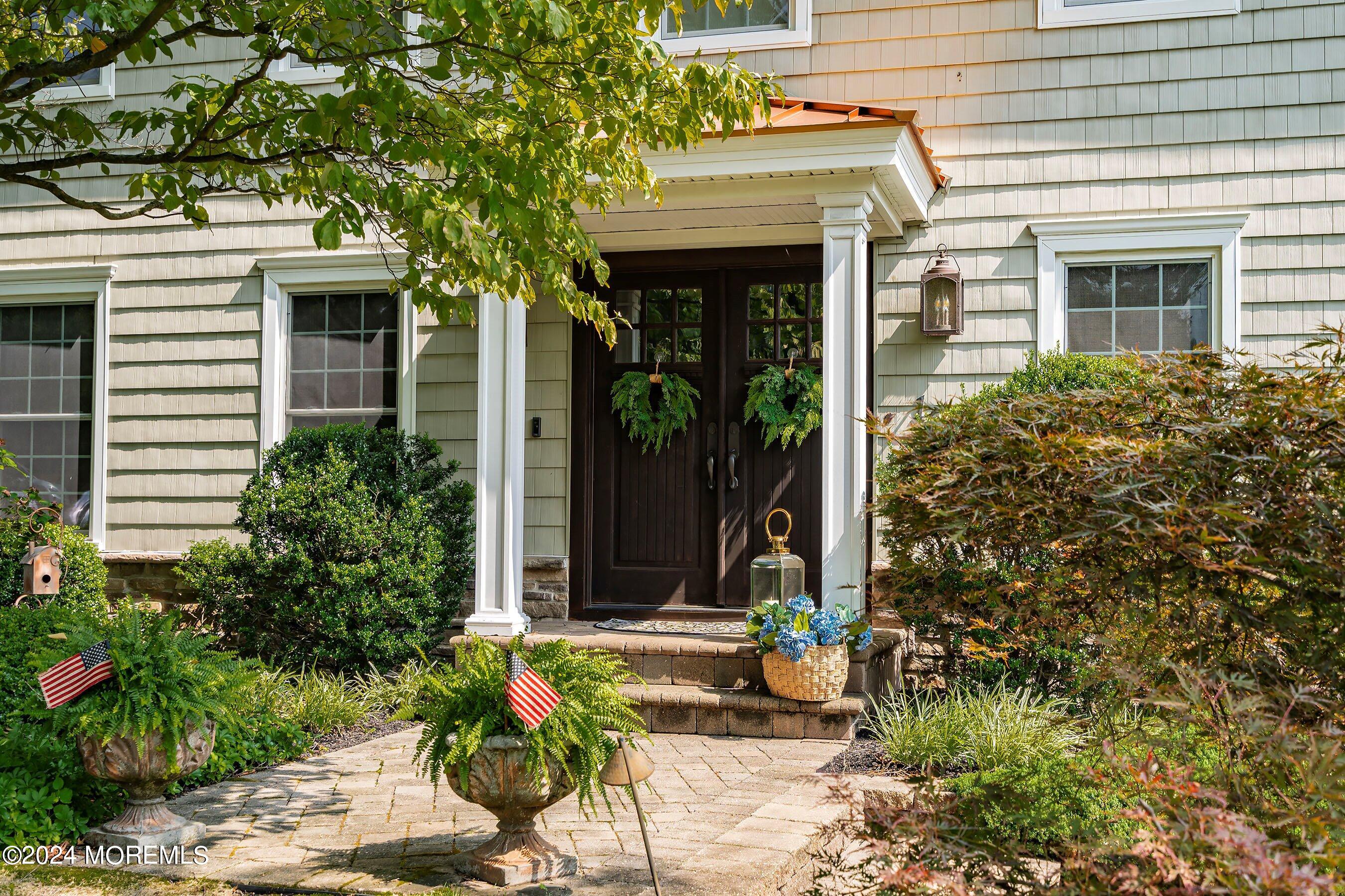 15 Doherty Drive Middletown, NJ 07748 - Photo 5 of 55 a view of a house with potted plants