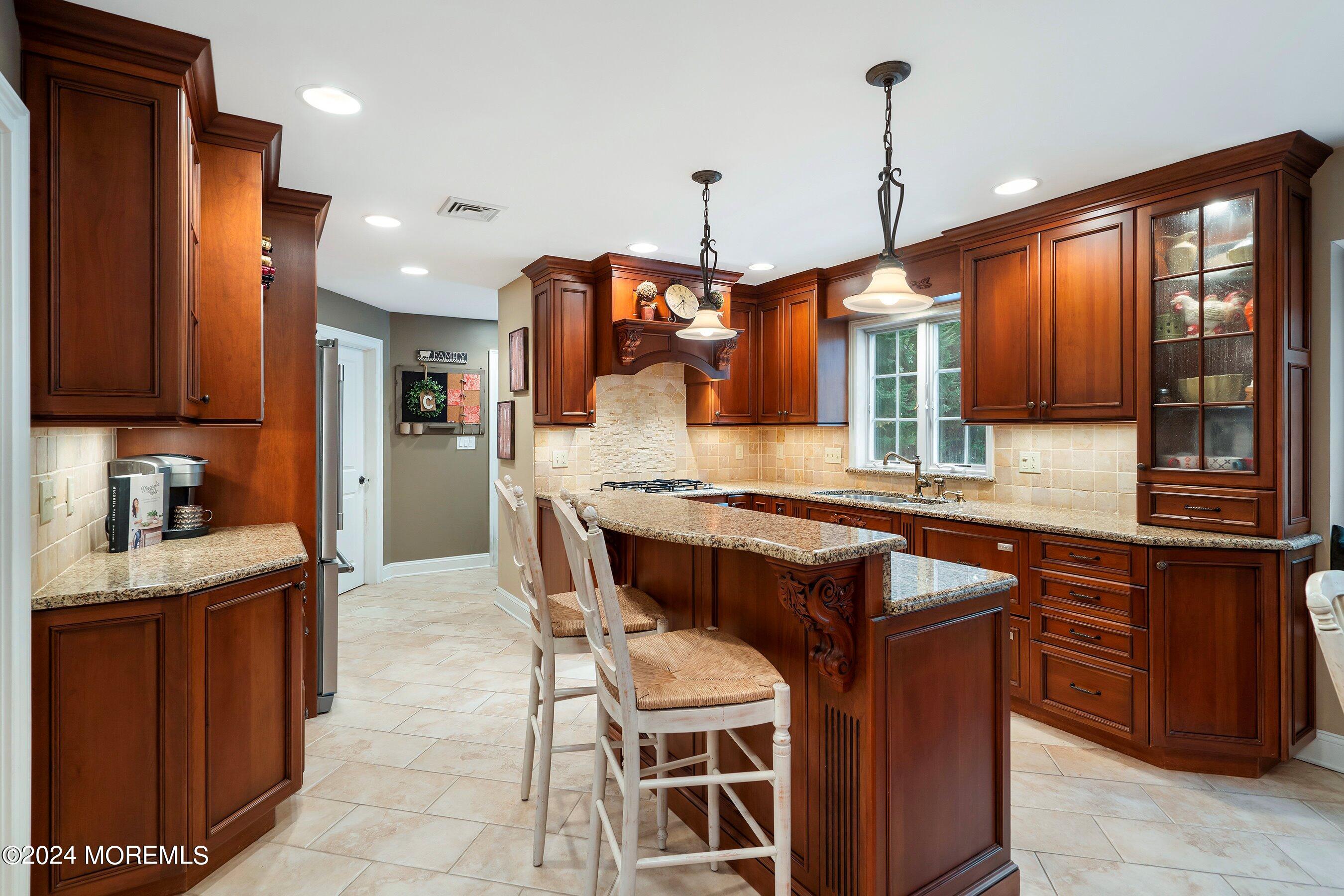15 Doherty Drive Middletown, NJ 07748 - Photo 10 of 55 a kitchen with a counter space cabinets and appliances