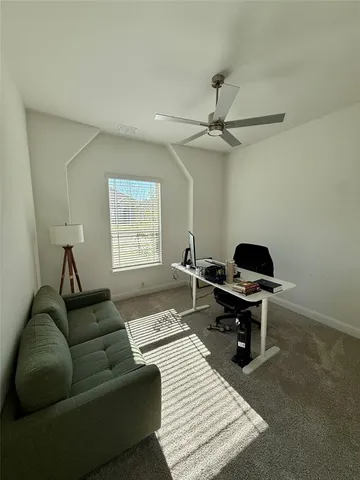 a kitchen with a sink cabinets and appliances