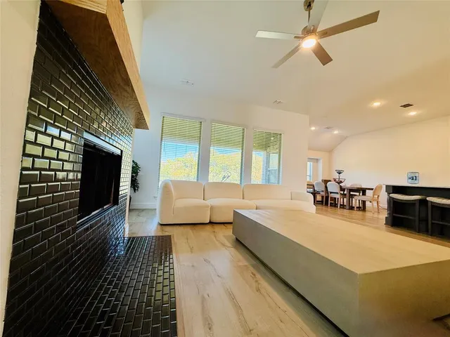 a very nice looking dining room with a large window