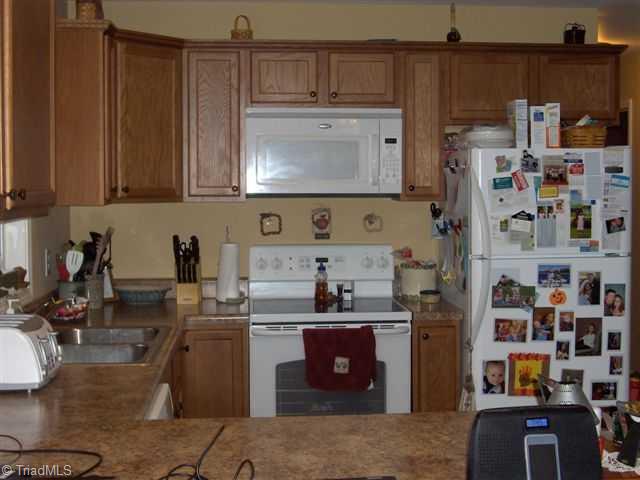 2107 Kivett Council Road Staley, NC 27355 - Photo 5 of 12 Kitchen.
