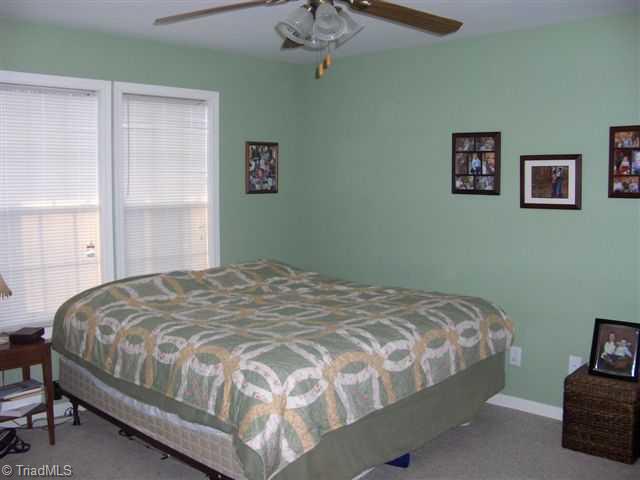 2107 Kivett Council Road Staley, NC 27355 - Photo 6 of 12 Master Bedroom.
